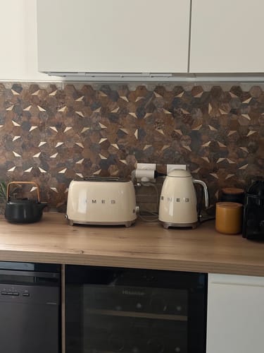 Customer photo review of Mosaïque Crédence Adhésive Cuivré Doré - facile a couper