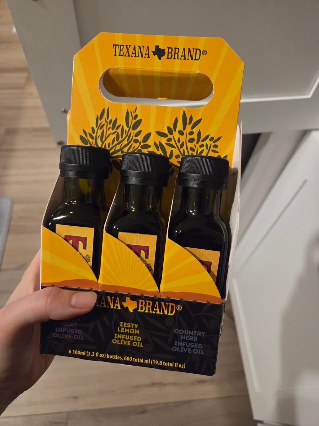 Customer photo review of Texana Brand EVOO, Garlic, Mesquite, Cajun, Lemon, and Herb  Six-Pack Sampler (3.3fl oz Bottles)
