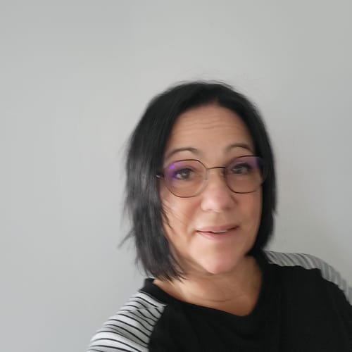 Reviewer with fuller, shoulder-length dark hair after using the Natural Rosemary & Keratin Shampoo.