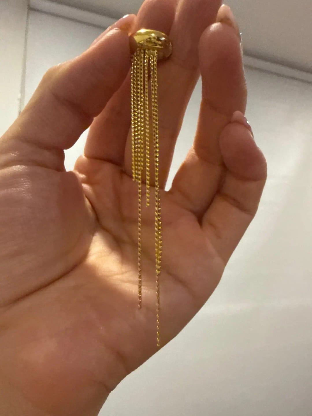 Customer photo review of Nova Tassel Ear Cuff