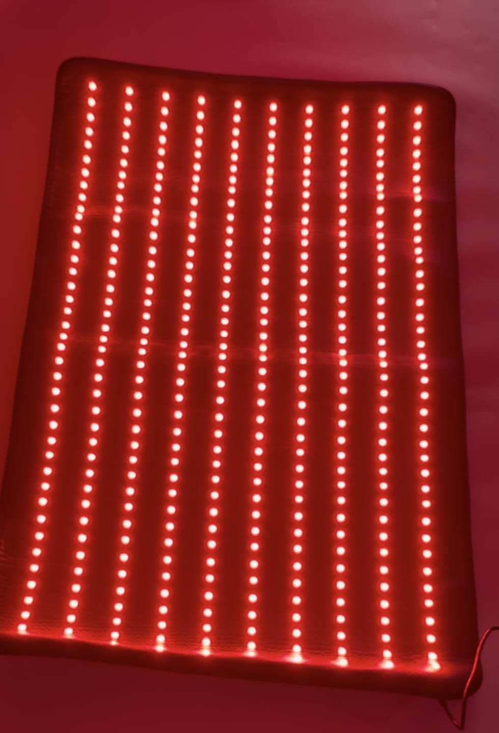 Customer photo review of LUMYHEALTH™ Red Light Therapy Mat with a Cozy Headrest