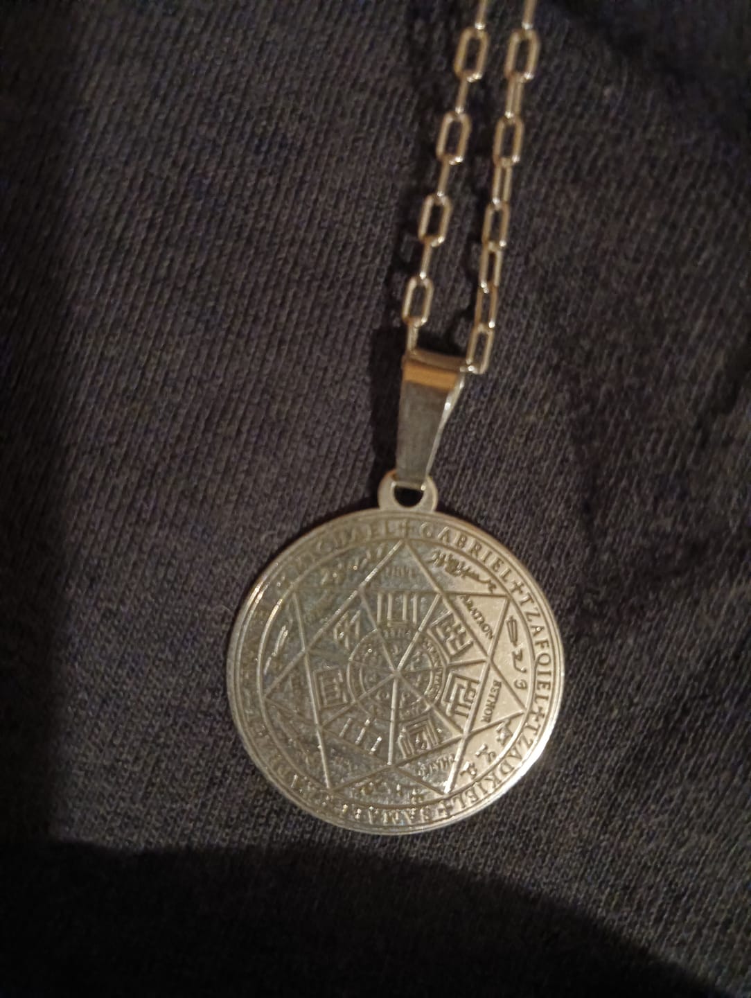 Customer photo review of Escudo protección siete arcángeles Plata pura
