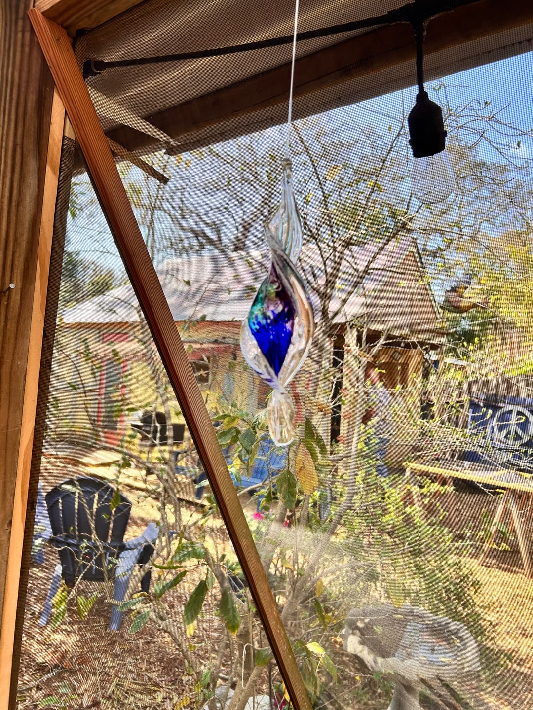 Customer photo review of Dichroic Spinner Suncatcher with Infused Cremains