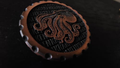 Customer photo review of The Octopus Coin — Copper