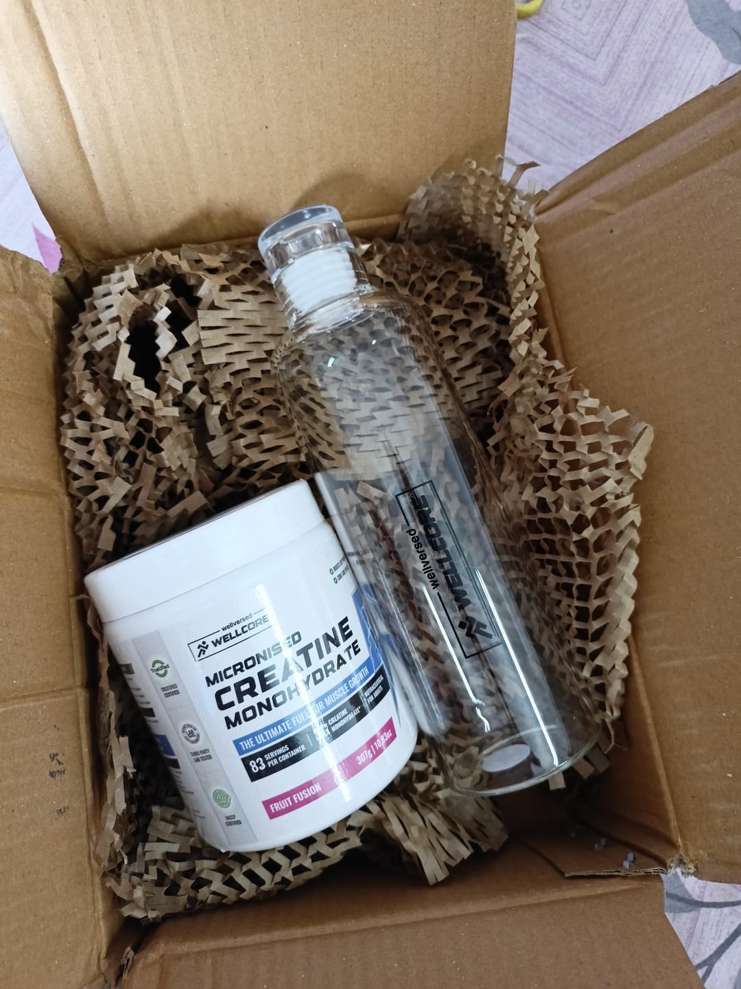 Customer photo review of Wellcore - Micronised Creatine Monohydrate (83 Servings, Fruit Fusion) + Premium Glass Bottle