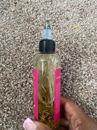 Customer photo review of Herbal Hair Growth Oil 2-in-1 Bundle