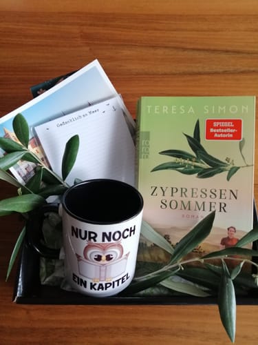 Customer photo review of Lesen Kaffeetasse Leseratte Geschenkidee Buch Leser Tasse mit Spruch Bücherwurm Nur Noch Ein Kapitel