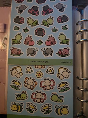 Customer shows more cute critter sticker sheets from the subscription, with ladybugs, frogs, bees, and butterflies.