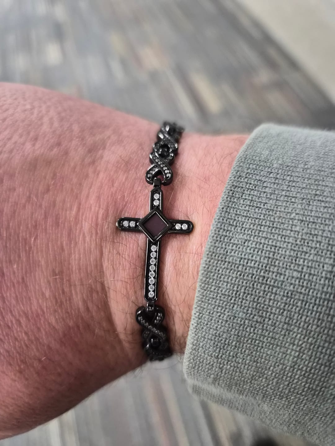 Customer photo review of Defender Cross Bracelet