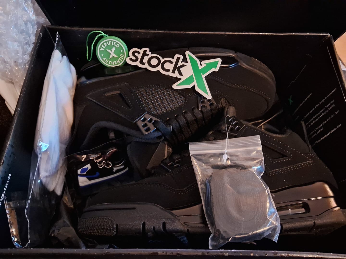Customer photo review of Air Jordan 4 Retro 'Black Cat'