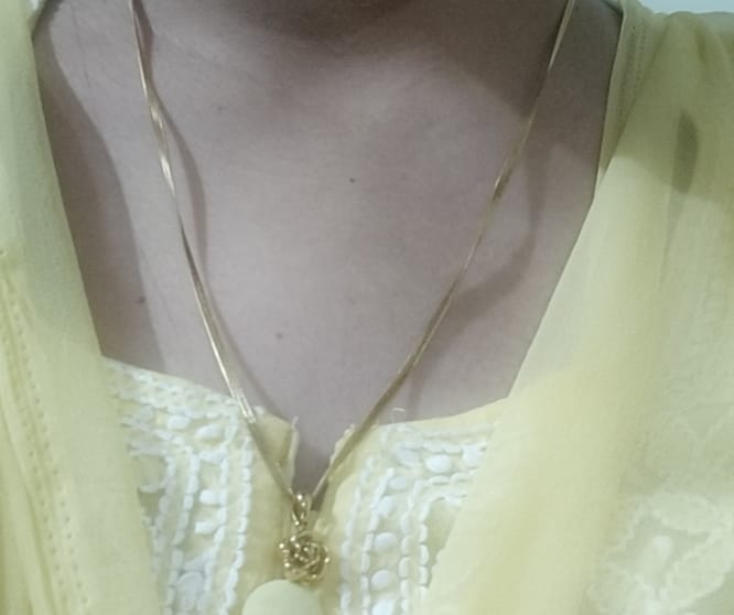 Customer photo review of Delicate Rose Necklace