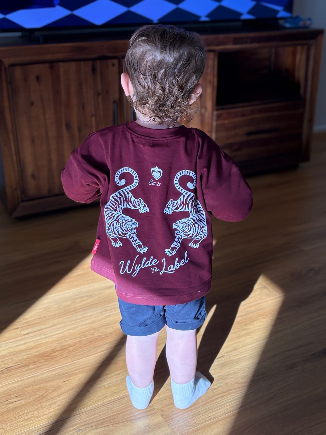 Customer photo review of Untamed Layer tee
