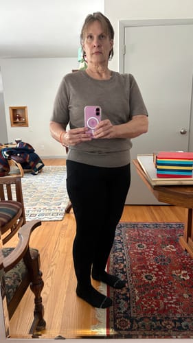 Reviewer wearing the Anna Crew Sweater in Simply Taupe, showing the overall fit and sleeve length.