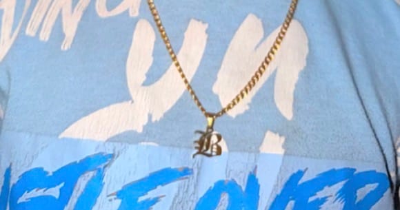 Customer photo review of Kids Gothic Letter Necklace w/ Cuban Chain