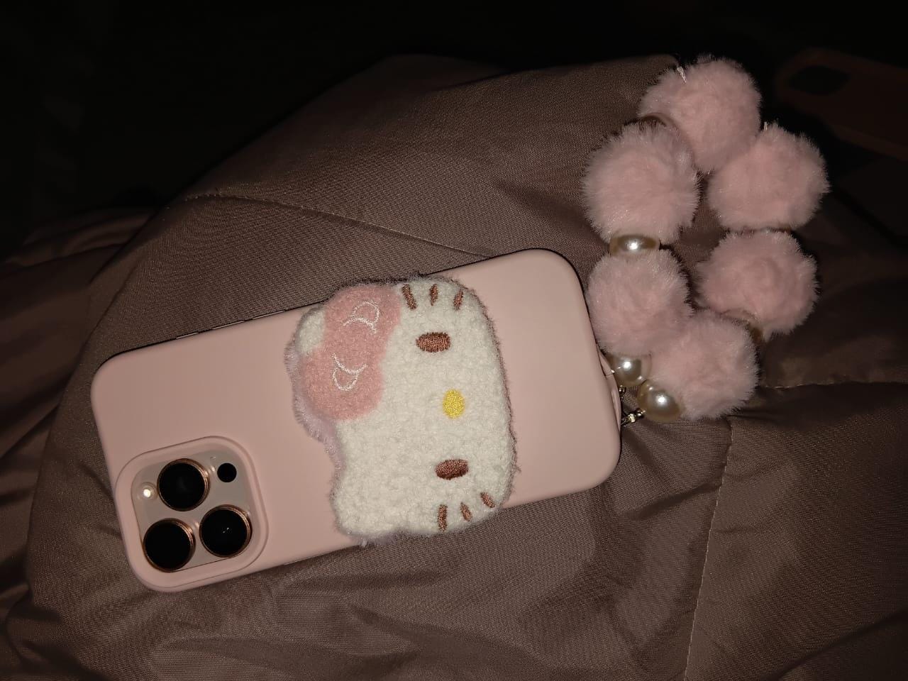 Customer photo review of 3D Hello Kitty Cartoon Pink Plush Fabric iPhone Case With Fur Pearl Lanyard