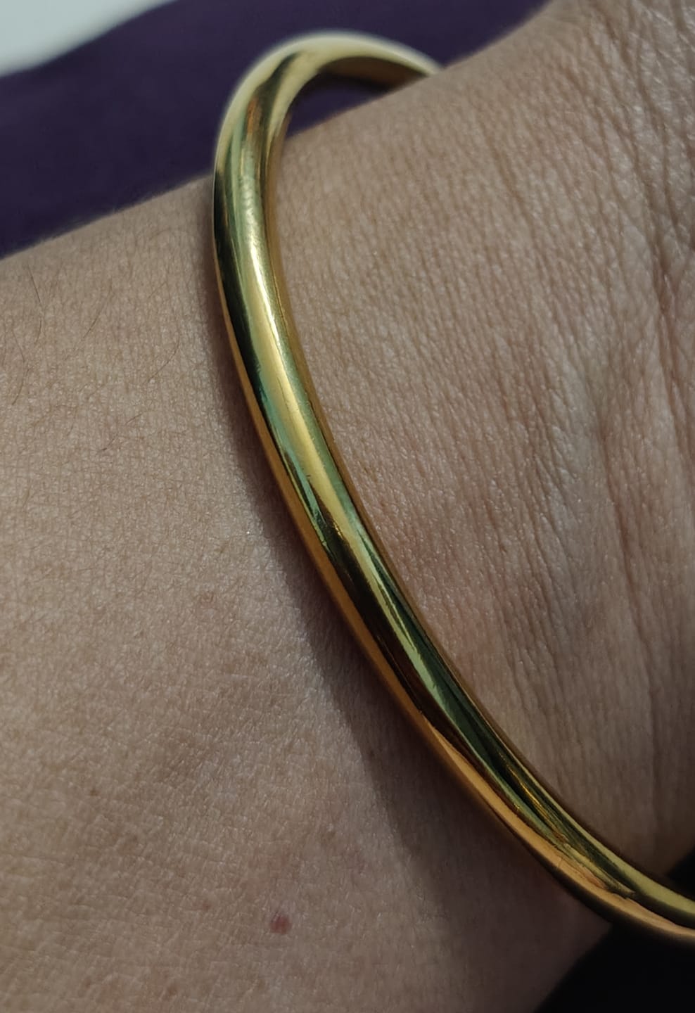 Customer photo review of Classic Gold Bangle Bracelet