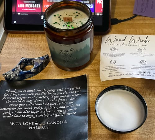 Customer photo review of Fated Mates | Wolf Shifter Candle | Leather + Pine + Smoky Amber | 8 oz Wood Wick Bookish Candle