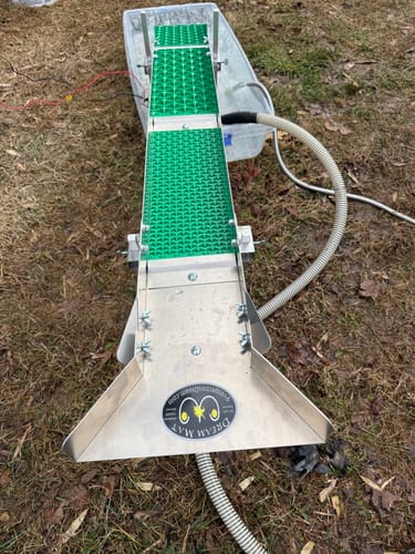 Customer's Sluice Box Flared Header installed on a 6-inch sluice box with a green Dream Mat, ready for use outdoors.