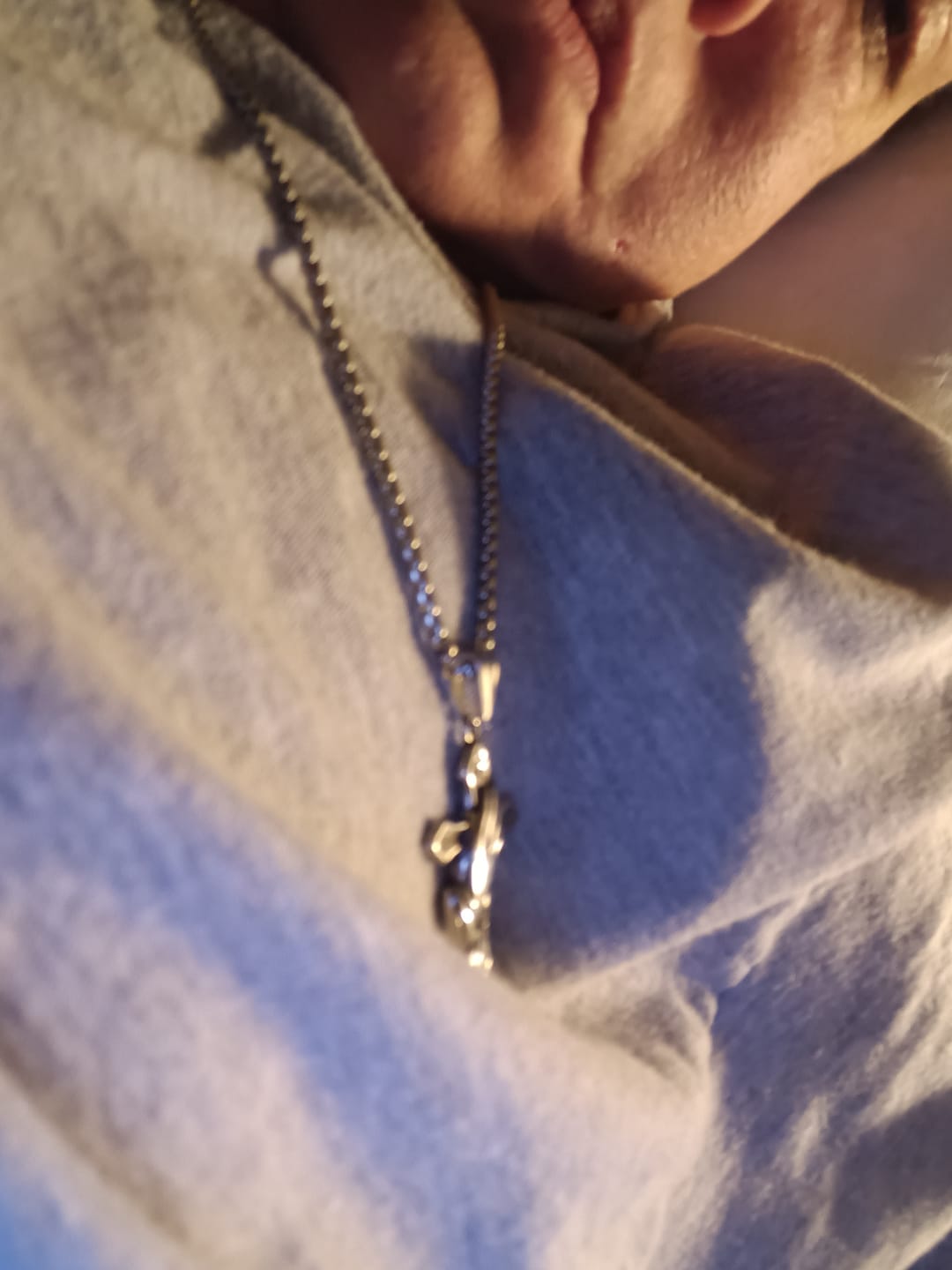 Customer photo review of Christianartworkshop Praying Hands Cross Stainless Steel Pendant Necklace