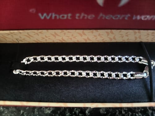 Customer's Silver Sleek Iced Bracelet with interlocking links resting inside its gift box.