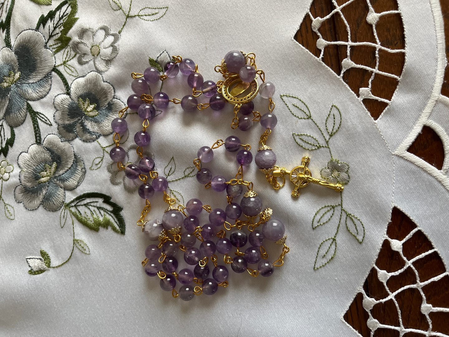 Customer photo review of Christianartworkshop Our Lady of Guadalupe & Crucifix of 8mm Round Purple Crystal Rosary