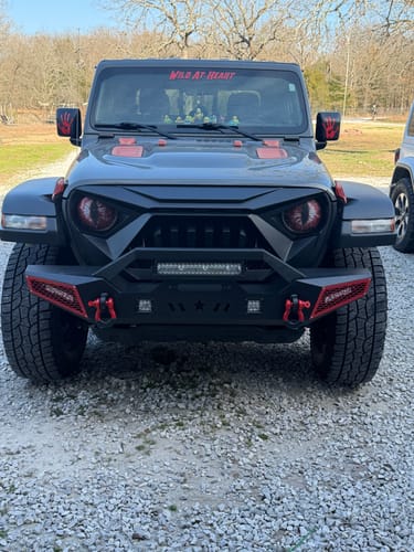 Customer's black Jeep with the matte black Goliath Grille installed, giving the vehicle a tough look.