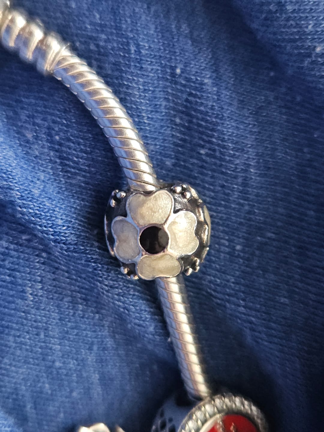 Customer photo review of PANDORA Yellow Daisy Sterling Silver Flower Charm With Yellow Enamel