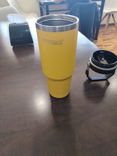 Customer photo review of BOTELLA TRAVEL MUG FLIPLID ACERO INOXIDABLE AMARILLO 880ML