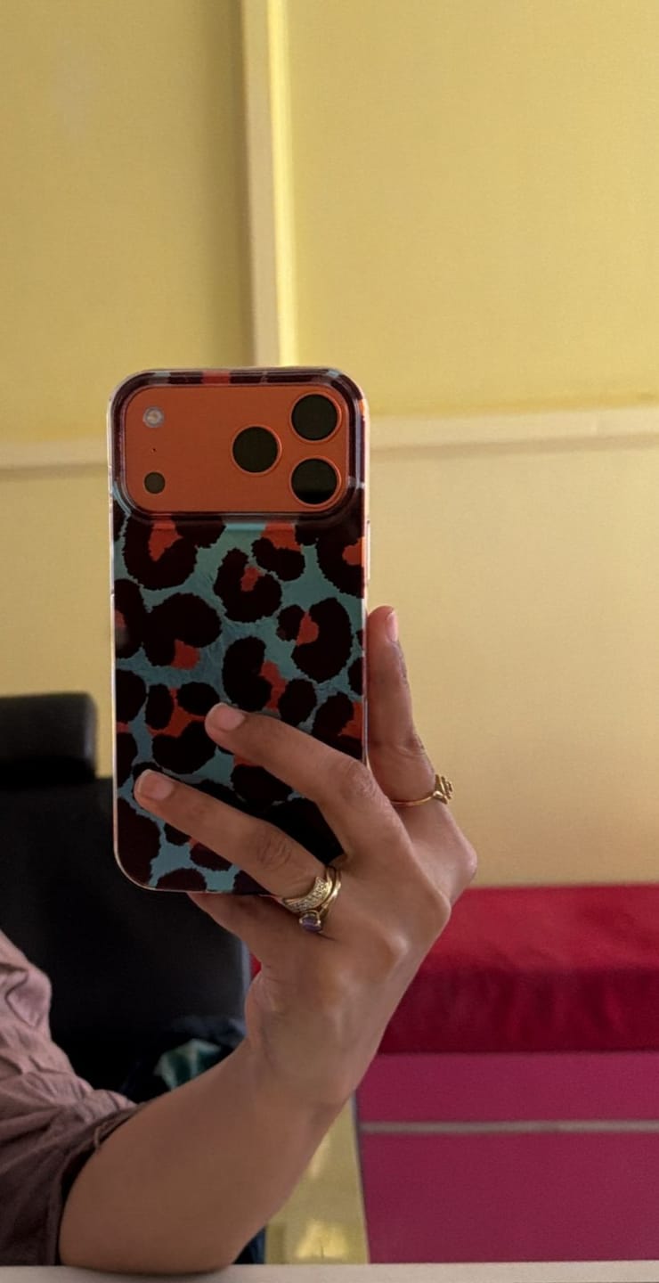 Customer photo review of Blue Brown Leopard Silver Laser iPhone Case
