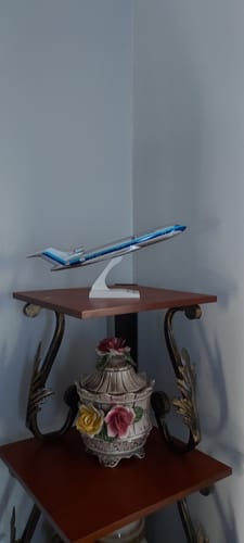 Customer's SKYMARKS EASTERN 727-200 model airplane assembled and shown on its display stand on a table.