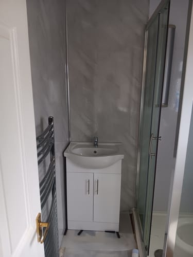 Customer photo review of Premium Grey Marble Gloss Shower Wall Panel – 1M x 2.4M