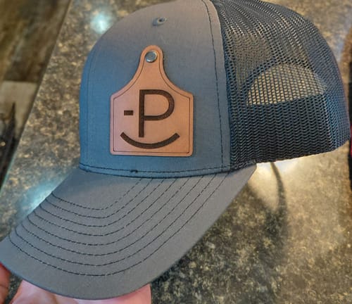 Customer photo review of Ear Tag Custom Leather Patch Trucker Hat - Richardson 112