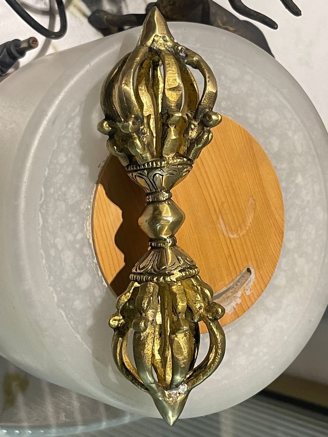 Customer photo review of Brass Vajra Dorje Ritual Tool Vastu Remedy for Protection, Tibetan Meditation and Home Temple Energy 15.7 x 4 cm | 340 gm