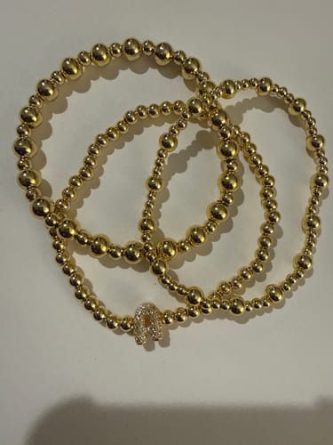 Customer photo review of Pulsera Bolitas Doradas Intercaladas