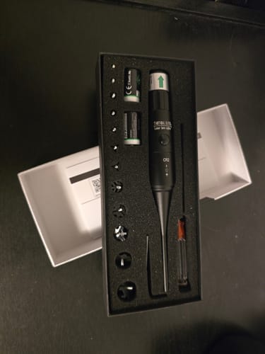 Customer's Site Right™ 2.0 - Boresighter kit laid out neatly in its open case with various accessories.