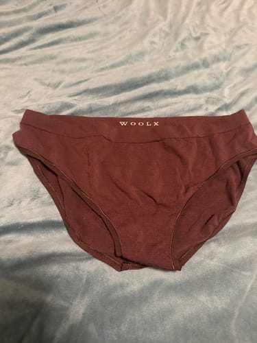 Customer's dark red Maeve Bikini laid flat to show its seamless construction.