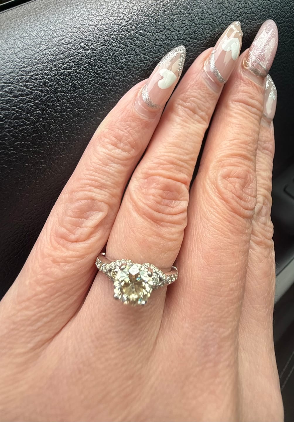 Customer photo review of Certified 1.80CT Round Cut Diamond Engagement Ring in 18KT White Gold