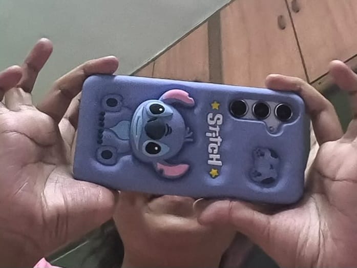 Customer photo review of 3D Stitch iPhone Samsung Attached Phone Holder Stand Rubber Silicone Case