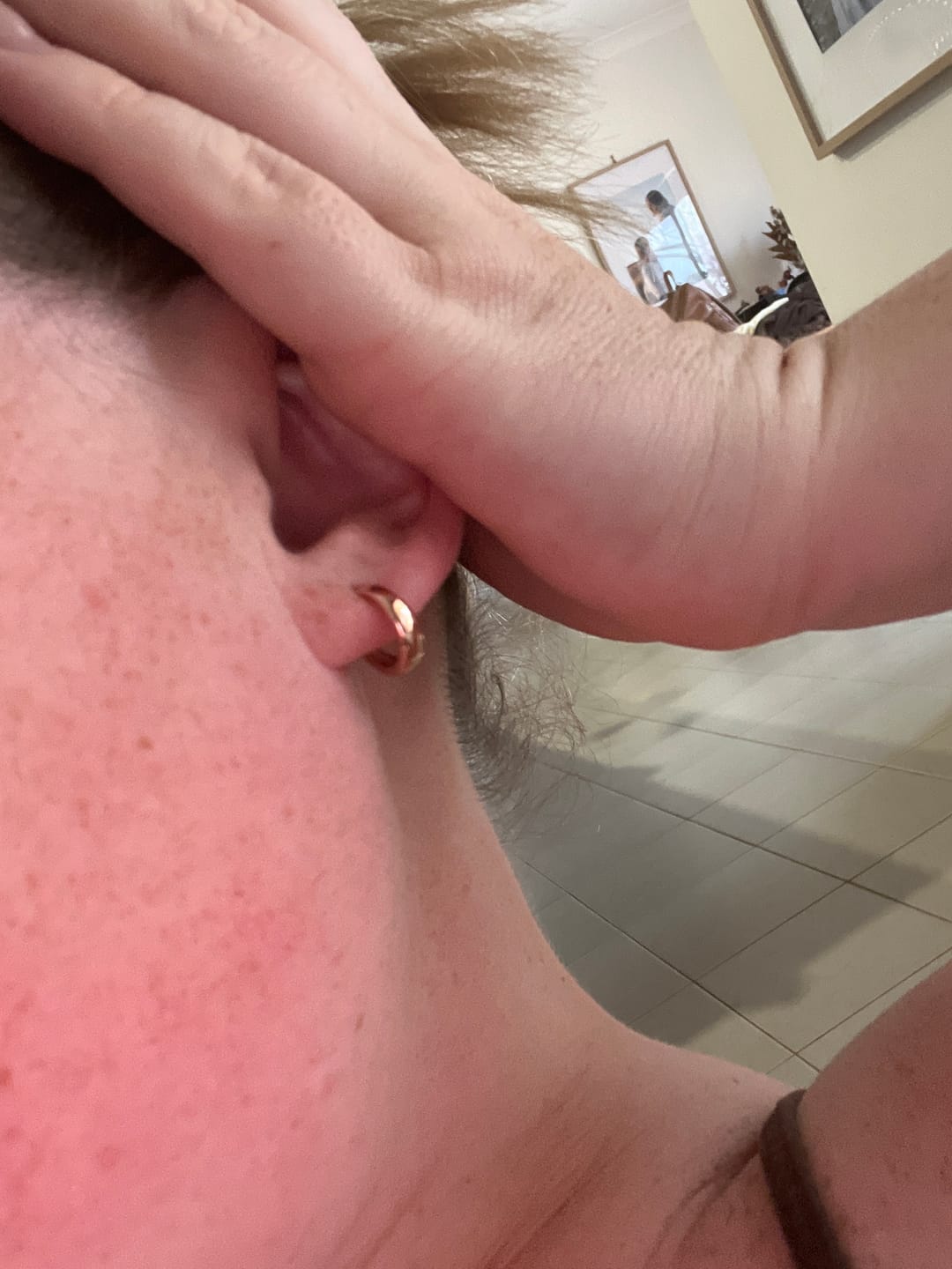 Customer photo review of Oval Dome Huggie Earrings