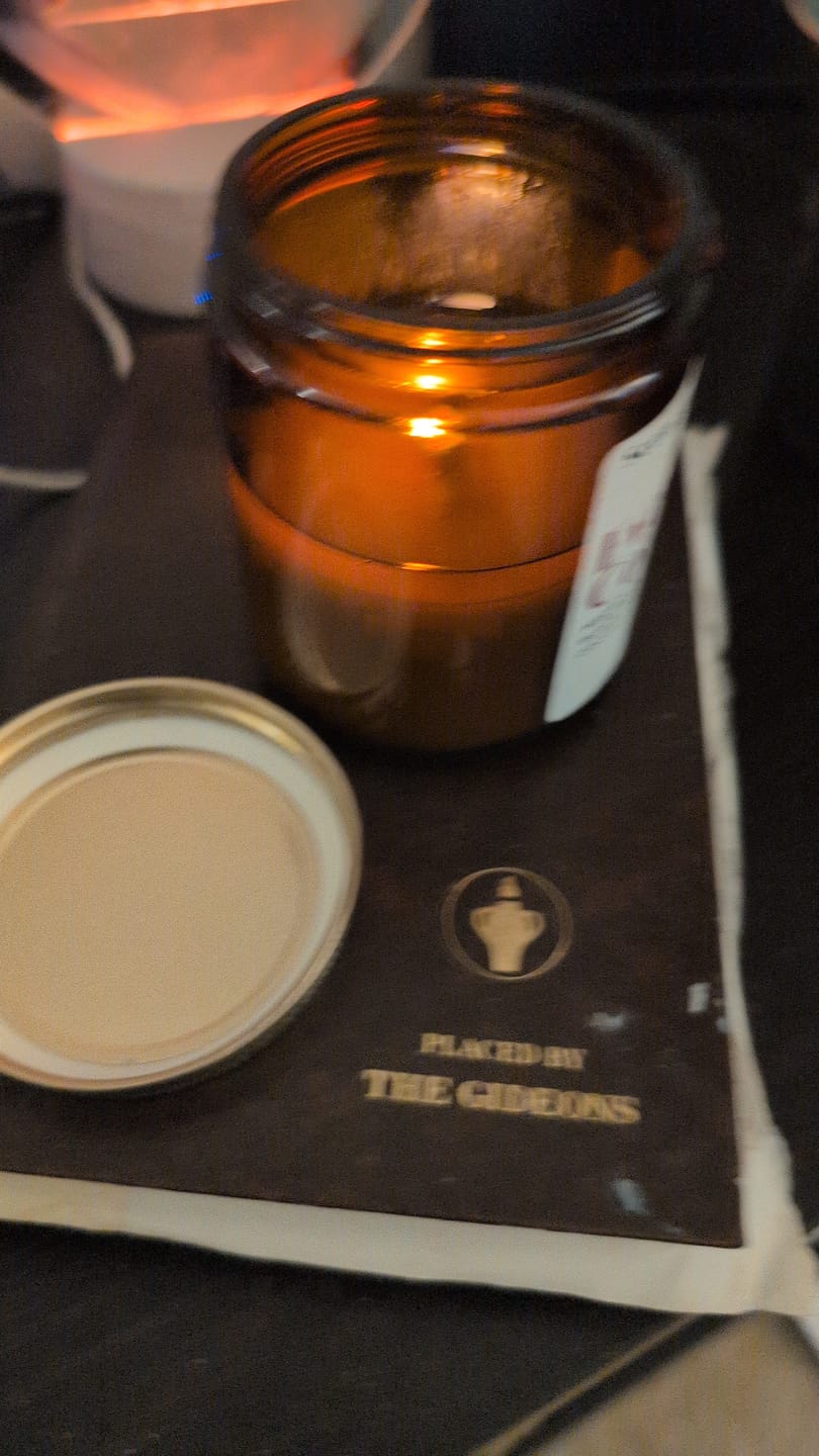 Customer photo review of All is Calm Scented Candle  - 7oz Amber Jar