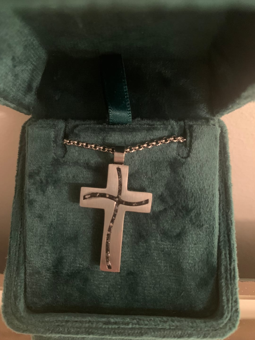 Customer photo review of Stainless Steel Keepsake Embossed Channel Cross Pendant