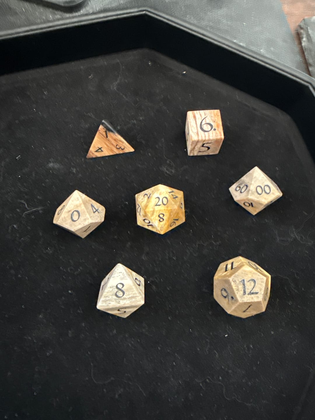 Customer photo review of URWizards D&D Petrified Wood Gemstone Engraved Dice Set(Limited edition)