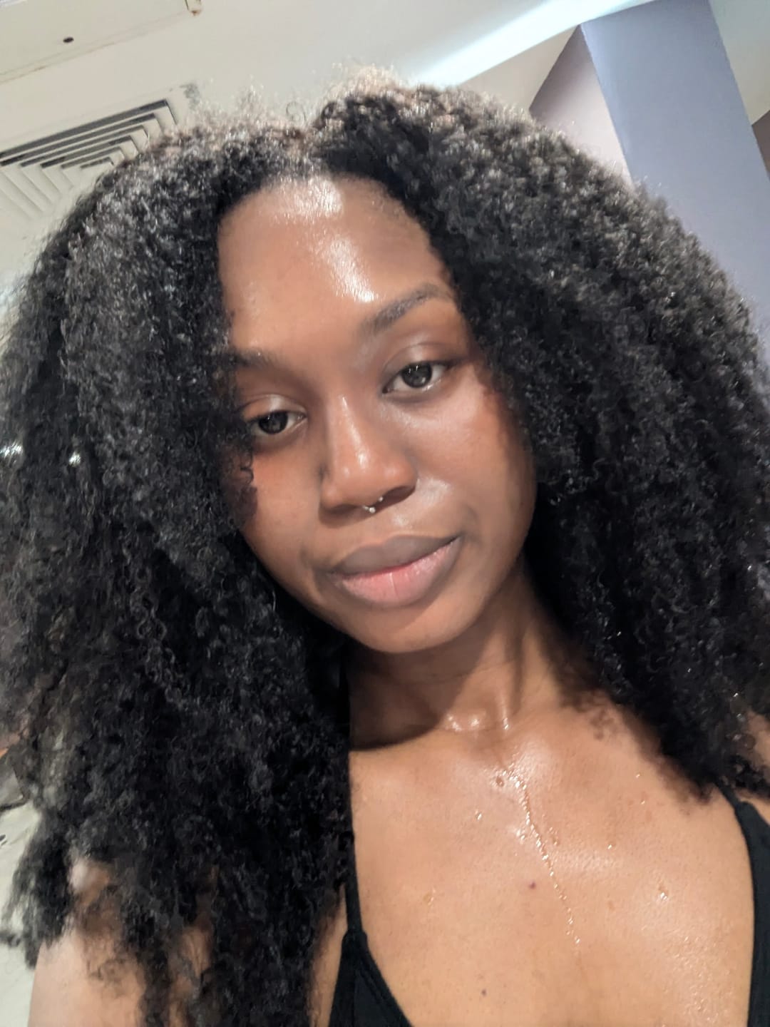Customer photo review of Teni  - Brazilian Multi-Texture Curly 5X5 Lace Closure Wig