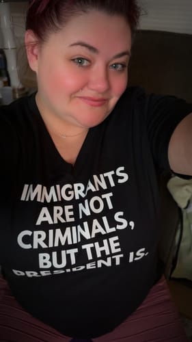 Customer photo review of Immigrants Women's V-Neck Tee