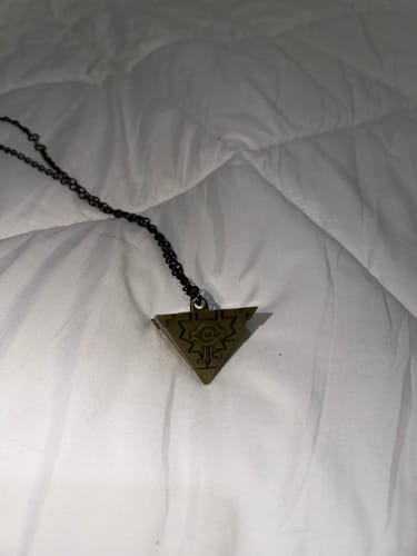 Customer photo review of Collar "Rompecabezas del Milenio"