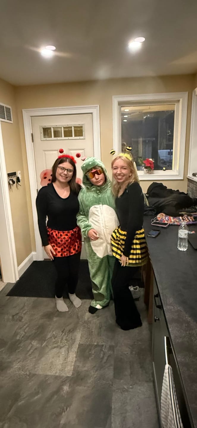 Customer photo review of OLAOLA Unisex Adult Plush Green Dinosaur Animals Onesie Pajamas Warm Home One-Piece Sleepwear