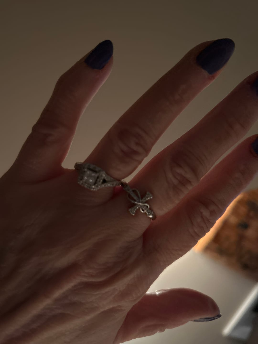 Customer photo review of Christianartworkshop Golden/Silver Mobius Cross Ring: Carry His Grace in Daily Wear