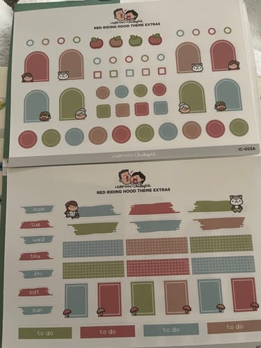 A customer's two 'Red Riding Hood Theme - Extras' sticker sheets with various planner stickers.