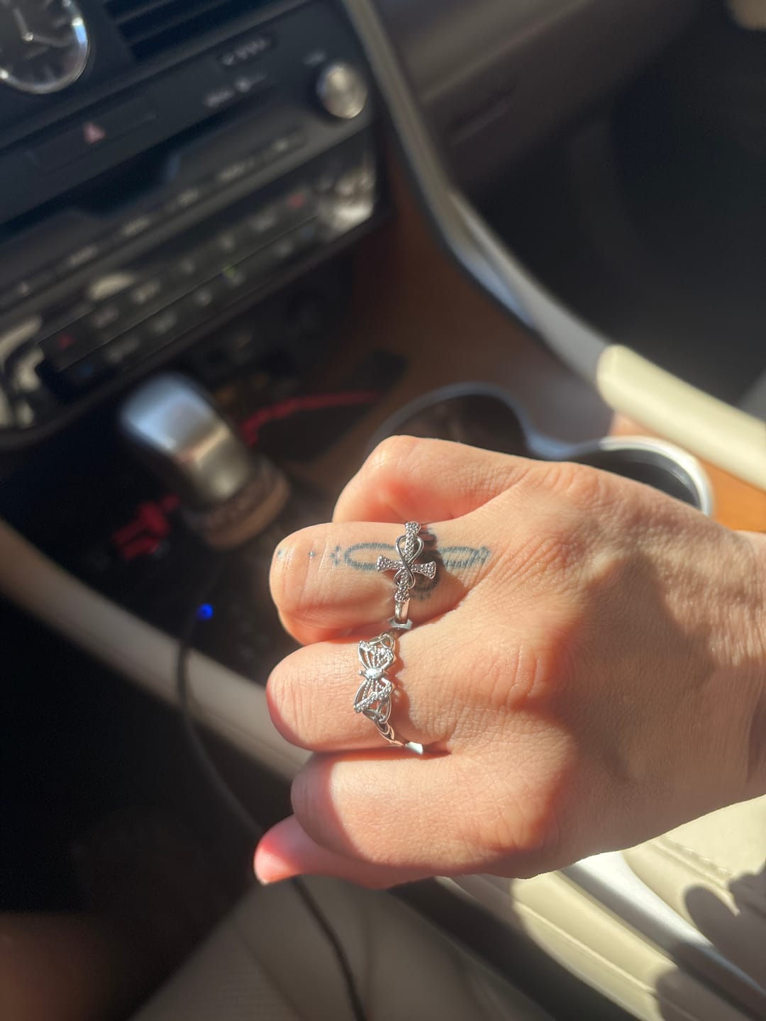 Customer photo review of Christianartworkshop Golden/Silver Mobius Cross Ring: Carry His Grace in Daily Wear