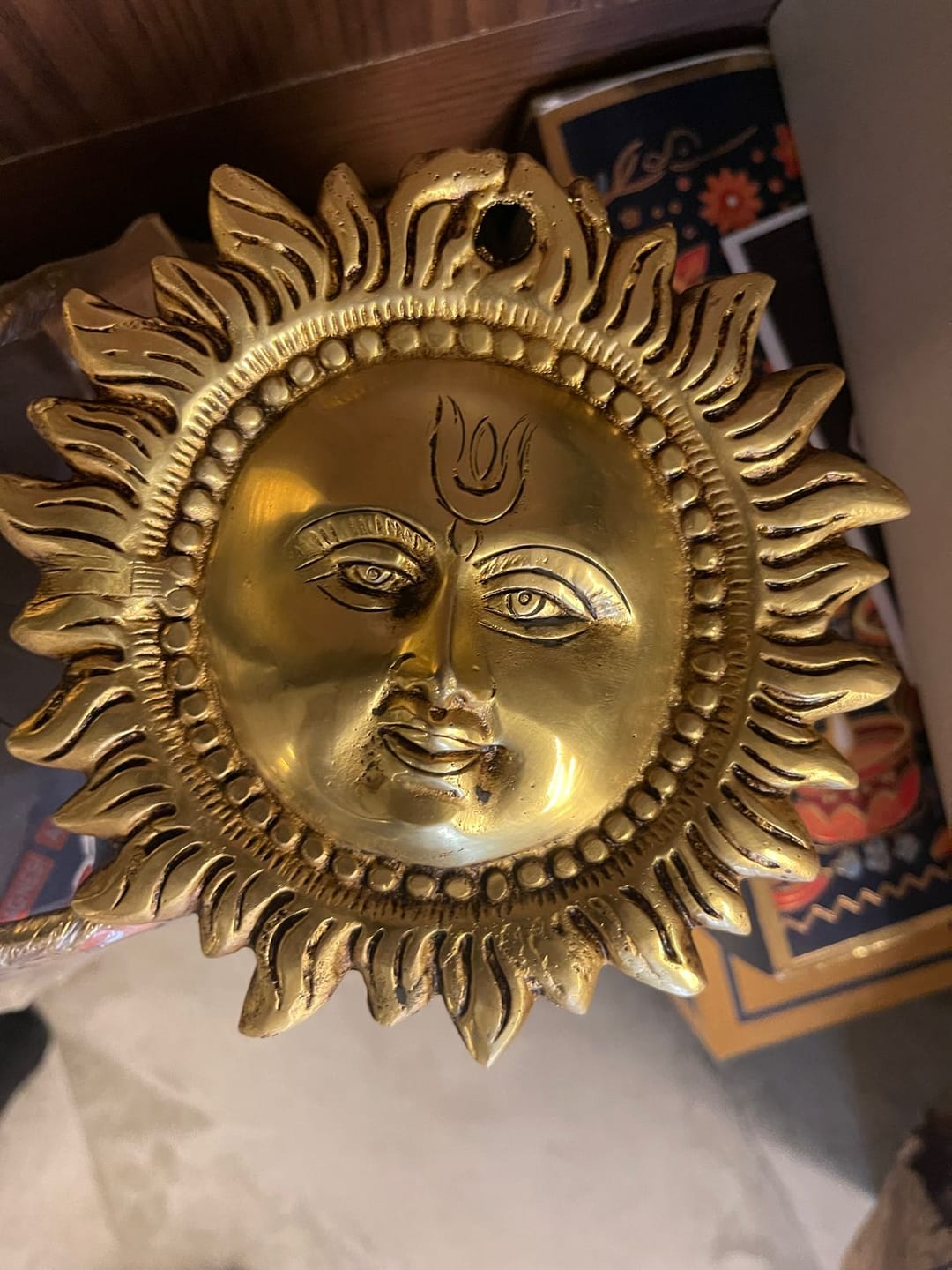 Customer photo review of Brass Vastu Sun Wall Hanging Idol Vastu Remedy for East Direction Balance, Fame and Positive Energy for Home, Office and Entrance Decor | 15 x 15 cm | 800 g